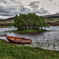 Schiebepuzzle mit dem Motiv Landschaft mit Boot in Schottland